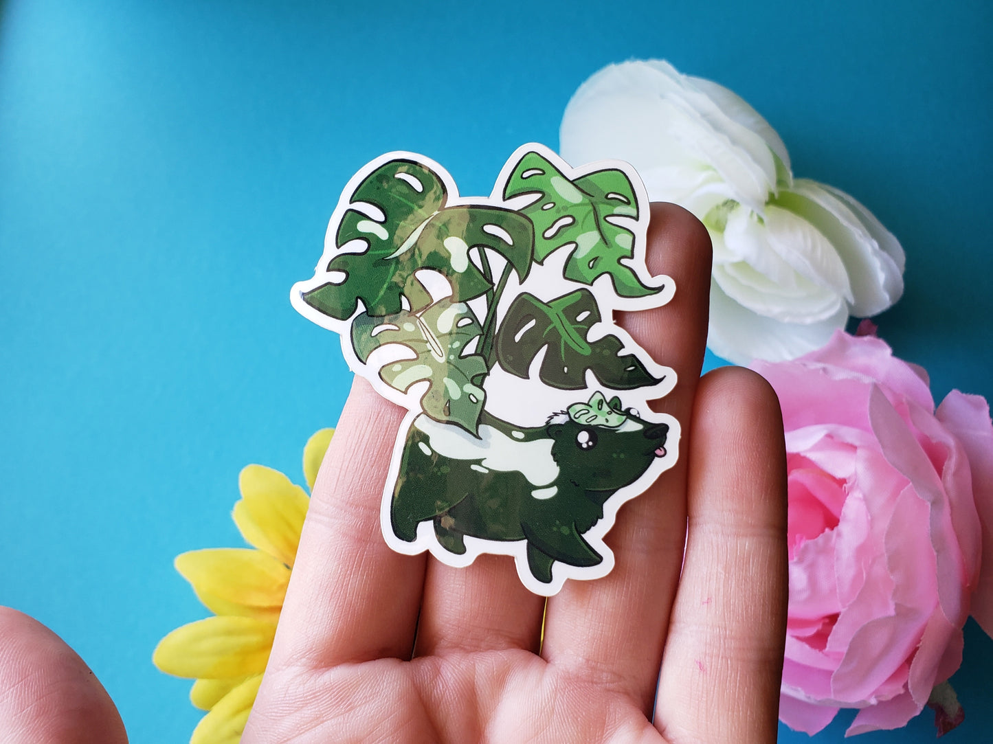 Skunkterra Sticker (skunk + monstera)